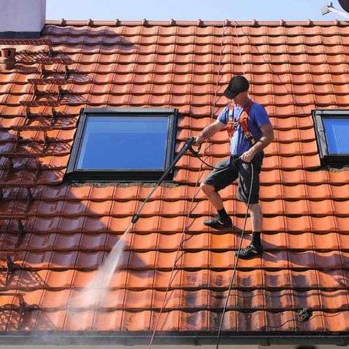 Reinigen van pannendak in Helden